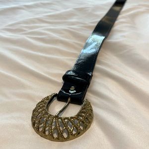 Vintage patent leather belt with decorative gold buckle